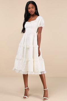 We're totally falling for dreamy and sweet vibes of the Lulus Gorgeously Romantic Ivory Lace Puff Sleeve Tiered Midi Dress! Lightweight woven fabric, with a subtle jacquard design, shapes short puff sleeves with elastic at the cuffs and shoulders. Bodice has a subtle sweetheart neckline and a flattering seamed fit that continues down to a Basque-inspired waist. Tiered skirt boasts adorable lace trim throughout as it falls to a flaring midi hem. Matching lace lines the cuffs and neck to complete Sweet Vibes, Design Shapes, Jacquard Design, Adhesive Bra, Tiered Midi Dress, Tier Skirt, Ivory Lace, Tiered Skirt, Dress 100