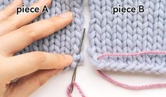 someone is knitting the ends of two pieces of knitted material with scissors and yarn