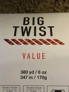 a white sign with red and black writing on it that says big twit value