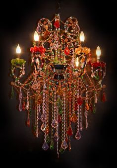 a chandelier with many different colored beads