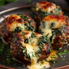 Spinach Garlic Meatballs Stuffed with Mozzarella: A Delicious Twist on a Classic Dish - Meatballs Stuffed With Mozzarella, Garlic Meatballs, Mozzarella Stuffed Meatballs, Meatball Dinner, Fresh Spinach, Classic Dishes, Healthy Eating Recipes, Meatball Recipes