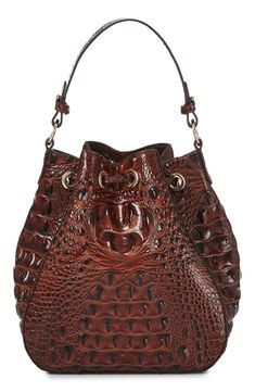 Glazed, croc-embossed leather and logo hardware underscore the signature appeal of a spacious bucket bag fitted with multiple straps for styling versatility. Drawstring closure Top carry handle; removable, adjustable crossbody strap Interior zip and wall pockets Structured silhouette with flat base for stability Logo-jacquard lining Leather Imported Emboss, Leather Bucket Bag, Leather Bucket, I Love Jewelry, Pocket Book, Wall Pockets, Crossbody Strap, Embossed Leather, Bucket Bag