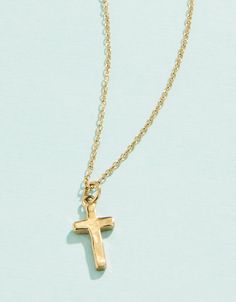 This delicate textured Cross Necklace as a beautiful reminder of your faith and you never have to take it off. Designed to shine through everyday wear, exercise, showers and a summer at the beach in tarnish free 14kt gold vacuum plating. Chrome Cross Necklace, Beachy Gold Jewelry, Dainty Gold Cross Necklace, Evry Jewels Necklaces, Cute Cross Necklace, Jewelry Gold Necklaces, Small Cross Necklace, Pearl Cross Necklace, Sideways Cross Necklace