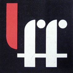 a black and red sign with the letter u in white letters on a black background