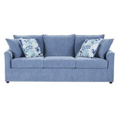 a blue couch with two pillows on it and one pillow in the middle of the couch