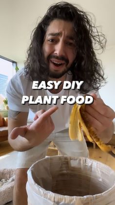 a man with long hair holding a banana in front of a plastic bag that says easy diy plant food