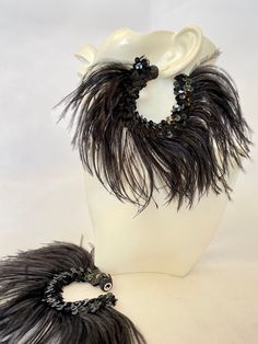 Dream-Catcher large hoop earrings with beautiful soft black full ostrich Feathers. Black sequin trim on both inner sides of earrings. Ear lobe earrings with safety back clip. Can also be made with clip-on. A great individual piece of jewellery that looks stunning on all styles.  Ideal for Festival, Carnivals, Music Concerts, stage-shows and weddings Ideal for special birthdays and anniversaries.  Big pair of flowing big hoop fashion feather earrings. 2 day shipping. Delivery within 5-8 working d Black Feather Jewelry For Party, Black Feathered Jewelry For Party, Lobe Earrings, Music Concerts, Dream Catcher Earrings, Ostrich Feather, Earrings Ear, Ostrich Feathers, Large Hoop Earrings