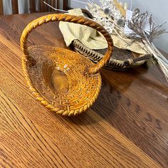 a basket sitting on top of a wooden table