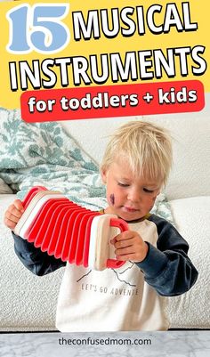 a young boy playing with musical instruments for toddlers and kids