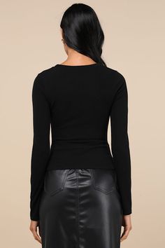 The Lulus Casual Energy Black Ruched Long Sleeve Crew Neck Top achieves effortlessly cute OOTDs for all your weekly adventures! Stretchy jersey knit shapes this essential top with a classic crew neckline and long sleeves. The fitted bodice features flattering ruching at the center before ending at a perfectly tuckable hem. Fit: This garment fits true to size. Length: Size medium measures 21" from shoulder to hem. Bust: Great for any cup size. Waist: Fitted - stretchy fabric allows custom fit. Undergarments: May be worn with any standard bra. Fabric: Fabric is very stretchy. Unlined. 48% Polyester, 48% Rayon, 4% Spandex. Hand Wash Cold. Do Not Bleach. Hang Or Line Dry. Color Separate. Do Not Twist. Imported. Lulus | Casual Energy Black Ruched Long Sleeve Crew Neck Top | Size Large. Ruched Long Sleeve Top, Crew Neck Top, Cup Size, Fitted Bodice, Stretchy Fabric, Custom Fit, Long Sleeve Top, Crew Neckline, Knit Jersey