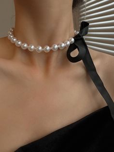 "White Pearl Necklace, Ivory Pearl Ribbon Tie Choker, Women's Head Band with Lace, Gift for Bride, Bridesmaid, Black, Pink, Grey The classic pearl necklace has long satin ribbon that you can make a tie at the back or side. It is also great to use as a head band that the lace can be a tie at back or braided with your hair.   Material: Imitation Pearl, Satin Ribbon, and Stainless Steel (not low quality brass or alloy), the stainless steel  is hypoallergic for sensitive skin.   *Adjustable: Yes *Pearl Color: White, Cream *Pearl Size: 8mm or 10mm (the style of big and small pearls is using 4mm pearl as the small one *Satin Ribbon: Your choice of the color from last picture of the listing.    Unless you request for different ribbon width, 8mm pearl is matching 10mm ribbon and 10mm pearl is matc Etsy Pearl Necklace, Pearl Ribbon Choker, Satin Ribbon Necklace, Black Outfit With Pearls, Pearl And Ribbon Necklace, How To Tie Necklace, Pink Ribbon Choker, Necklace With Ribbon, Pearl Ribbon Necklace