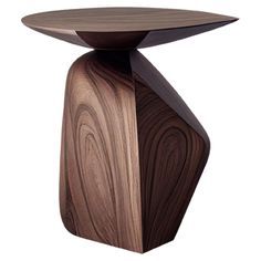 a wooden table that has been designed to look like an abstract piece of wood with a curved