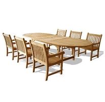 a large wooden table and chairs with one chair facing the camera, on a white background