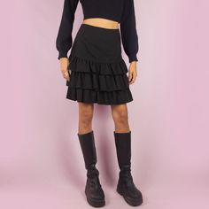 The Y2K Ruffle Black Mini Skirt is a vintage 2000s piece featuring playful tiered ruffles and a side zipper closure. Its mini length and flattering fit make it perfect for casual outings and evening events. ESTIMATED SIZE M TAG SIZE EUR 38/40 MEASUREMENTS Length 48cm - 18.90 inch Waist 78cm - 30.70 inch Hips 100cm - 39.37 inch Our model is 172 cm tall and usually wears size XS. Please be aware that some items may be slightly pinned on the model to demonstrate the correct fit. We ship worldwide from Spain and offer free shipping on all orders when you buy 3 items or more! ♥ https://adultworldshop.etsy.com ♥ ADULTWORLDSHOP.NET ♥ INSTAGRAM, TIKTOK & YOUTUBE @adultworldshop Mini Rock, Black Y2k, Vintage Rock, Skirt Mini, Black Mini Skirt, Womens Skirts, Vintage 2000s, Vintage Skirt, Black Mini