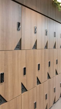 the lockers have numbers on them and are lined up against each other in rows