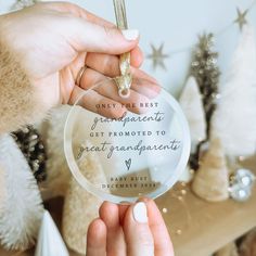 a person holding a glass ornament with the words, only the best grandparents get honored to great grandparents