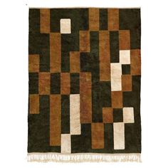 a brown and black rug with squares on it