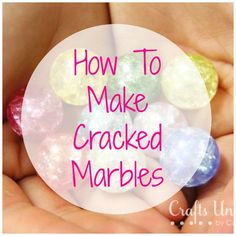 hands holding colorful marbles with the words how to make cracked marbles on them