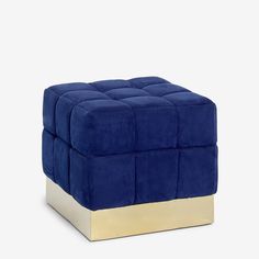 a blue and gold foot stool on a white background