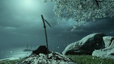 an image of a tree and some rocks in the grass with a ship in the background