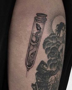 a man's arm with a tattoo on it