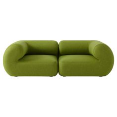 two green couches sitting next to each other