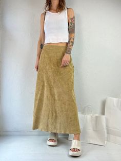 "- Stan Herman tan suede leather maxi skirt - Lined with a zipper up the side - Elastic at the waist - Made in China - Tagged 10  Waist: 27\" Hip: 20\" Length: 35.5\"" Suade Skirt, Leather Maxi Skirt, Midi Skirt Outfit, Rayon Blouse, Maxi Skirt Outfits, Denim Midi Dress, Skirt Medium, Suede Skirt, Tan Suede