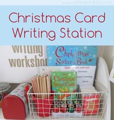 the christmas card writing station is organized with books, pens and pencils in baskets