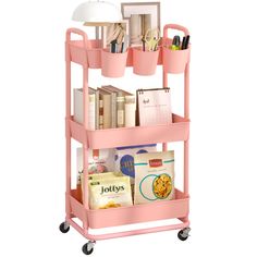 a pink cart with two bins on top of it and some books in the back