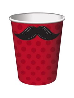 a red paper cup with a black mustache on the side and polka dots around it