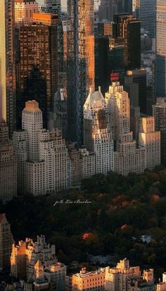 an aerial view of new york city at sunset