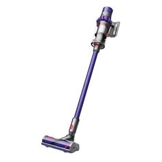 a purple and silver vacuum cleaner on a white background