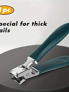 a pair of green handled scissors on top of a black object with the words special for thick nails