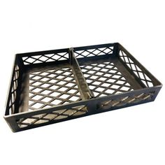 two metal trays sitting on top of each other