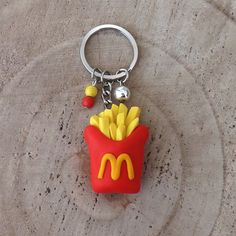 a mcdonald's keychain with french fries in it