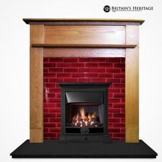 a fire place with a red brick fireplace and wood trim around the edges, in front of a white background