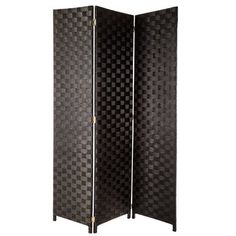 a black room divider with checkered design