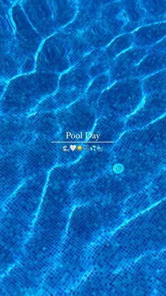 a pool with blue water and the words pool day written on it's side