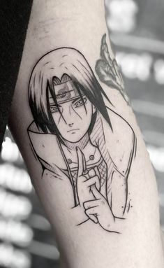 a person with a knife and fork tattoo on their arm that is black and white