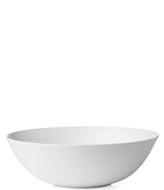 a white bowl sitting on top of a table