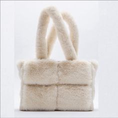 Beautiful Faux Fur Tote Bag From Zara In Ecru. New, Never Worn. Last Photo Is Of The Actual Tote :) Faux Fur Exterior. Shoulder Straps. Lined Interior With Pocket. Zipper Closure. Height X Length X Width: 9.8 X13.2 X 5.3 Inches (25 X 33.5 X 13.5 Cm) Fur Tote Bag, Faux Fur Purse, Bag Zara, Fur Purse, Zara Bags, Fur Bag, Pink Tote Bags, Evening Purse, Pretty Bags