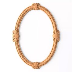 an oval wooden frame with decorative carvings on the edges and sides, set against a white background