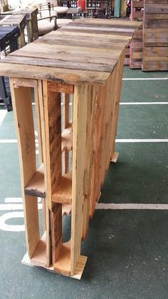 a table made out of wooden pallets in a store