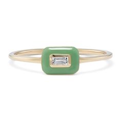 This stylish ring features a baguette white natural sapphire framed by green enamel. Crafted in warm 14-karat yellow gold  it makes a pretty addition to any look. Baguette Engagement Ring, Natural Emerald Rings, Bezel Engagement Ring, Green Rings, Stylish Rings, Snacks Recipes, Enamel Ring, Green Enamel, Gold Enamel