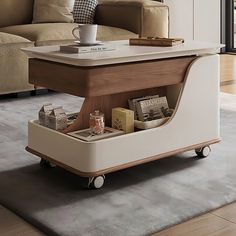 a coffee table with magazines on it in a living room