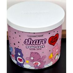 This Limited Edition Care Bears Share Your Care Goose Creek Candle Co. Candle Is Perfect For Any Room. With A Burning Time Of Up To 50 Hours, This Traditional Wick-Burning Candle Is Made Of Essential Oils And Soy Wax Blend, Featuring A Delightful Scent Of Strawberries, Buttercream, Lemon, And Vanilla. The Candle Comes In A Medium-Sized Jar, Measuring 4 Inches In Length, Height, And Width, And Has Multiple Wicks For A Decorative Effect. It's A Great Addition To Your Candle Collection, Perfect For Goose Creek Candles, Goose Creek, 3 Wick Candles, Candle Collection, Care Bears, Make Color, Burning Candle, Soy Wax, Wicked