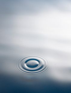 water ripples in the middle of a body of water