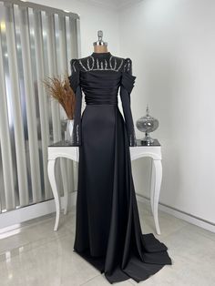 It is made of 100% satin fabric.  It weighs 900 grams.  It is a lined dress.  The length of the product is 155 cm.  Measurements for size 38 are 92 cm bust, 76 cm waist, 94 cm hips. Long Sleeve Satin Finish Evening Dress For Formal Occasions, Long Sleeve Satin Finish Evening Dress, Long Sleeve Satin Evening Dress For Formal Occasions, Formal Long Sleeve Satin Finish Evening Dress, Satin Evening Dress With Sweep Train, Evening Satin Maxi Dress With Sweep Train, Evening Floor-length Satin Dress, Long Sleeve Satin Finish Evening Dress For Party, Long Sleeve Evening Dress With Satin Finish For Party