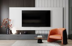 an orange chair in front of a flat screen tv on a wall mounted entertainment center