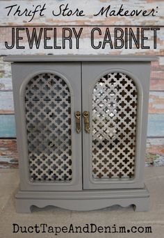 a gray cabinet with the words thrift store makeover jewelry cabinet